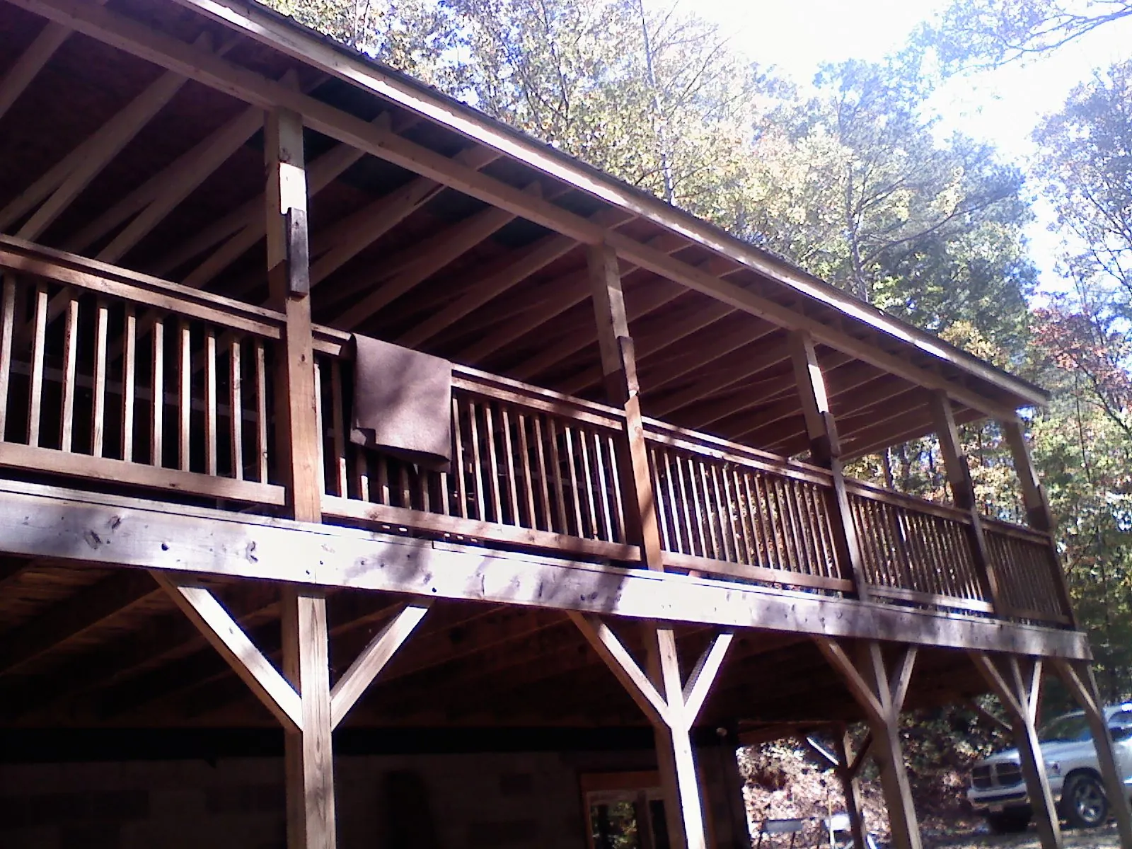 Timber framing under a new elevated porch and deck — Roof Leak Repair in Little Rock by Roofing Brothers